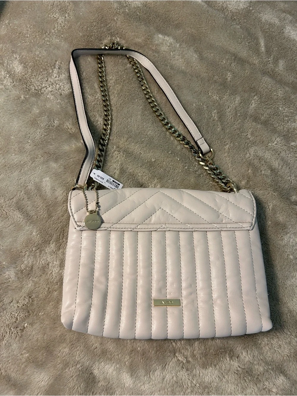 ALDO Cream Quilted Abilaniel Crossbody Bag with Gold Chain Strap